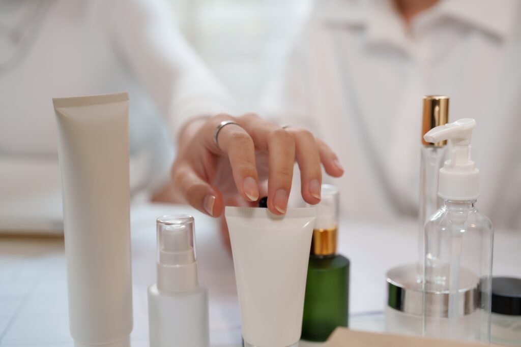 Skincare products displayed during a professional skin consultation, featuring both everyday and professional-grade formulations.
